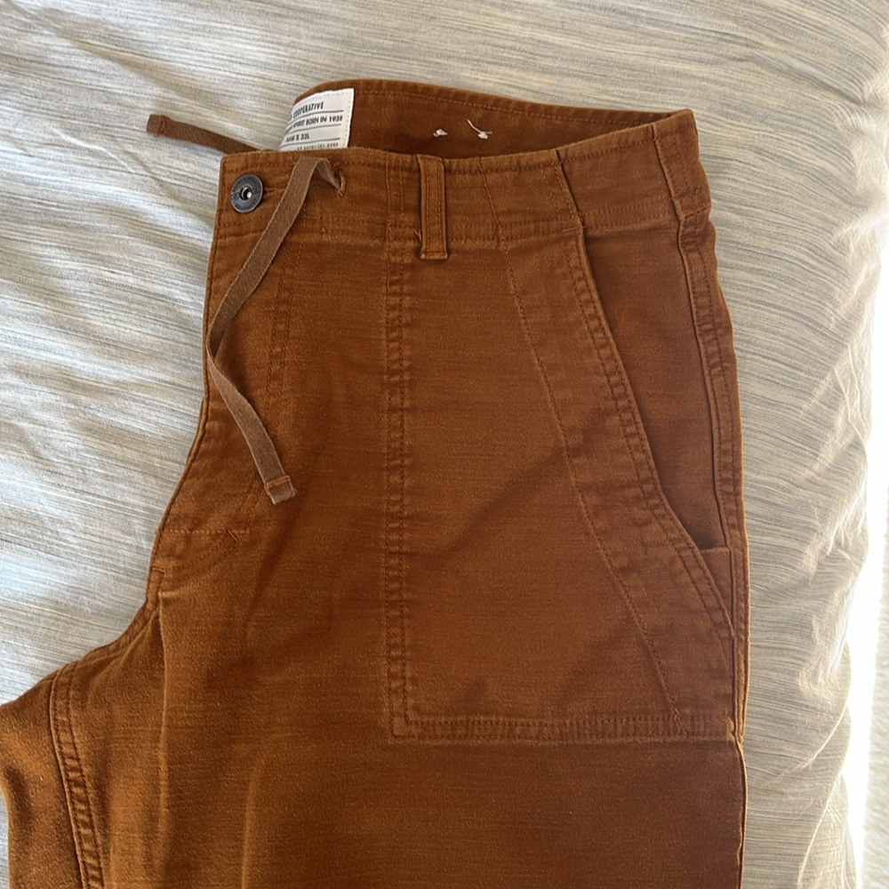Men’s REI joggers with drawstring and zipper.